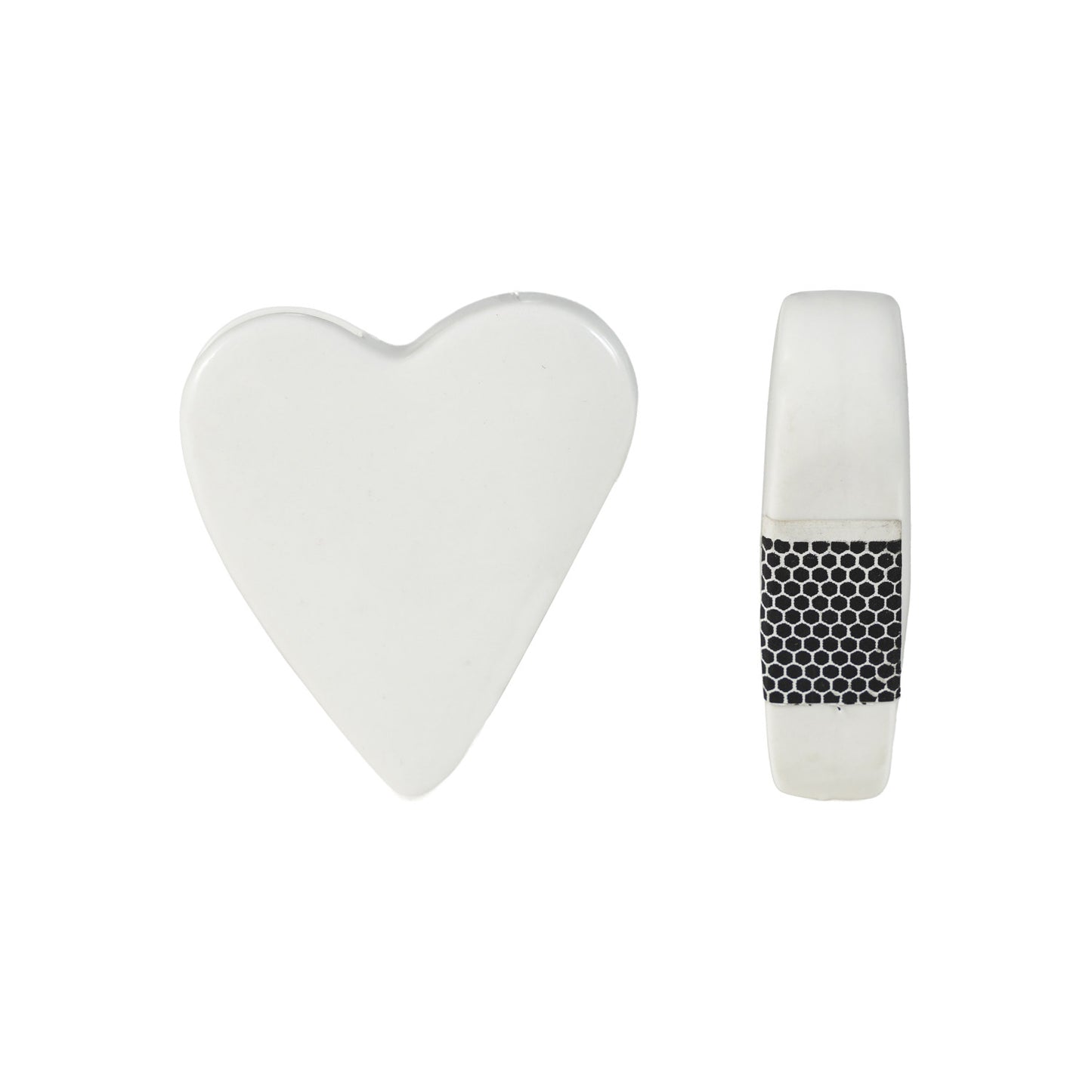 Stoneware heart-shaped match holder in matte white with a textured striker strip on the side.