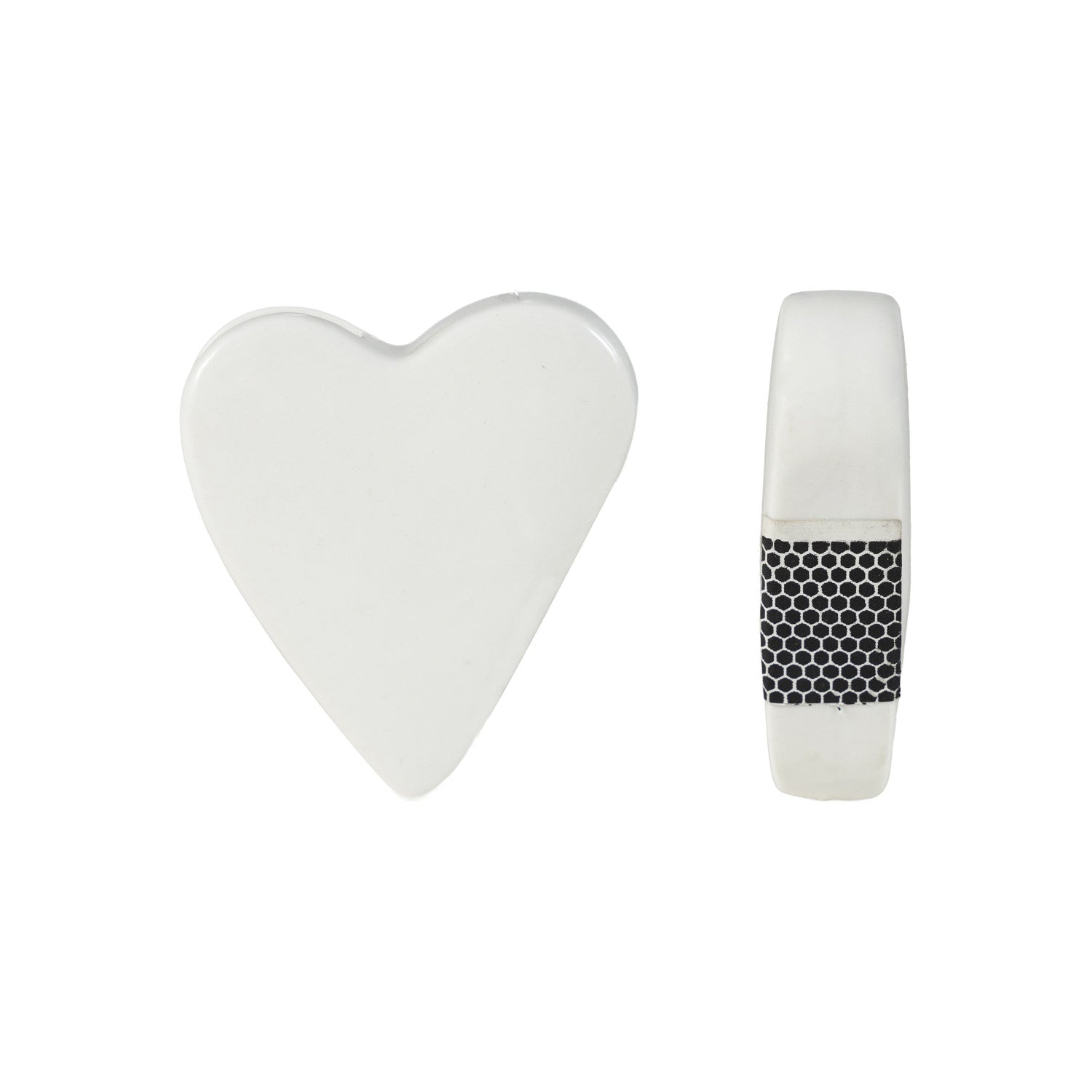 Stoneware heart-shaped match holder in matte white with a textured striker strip on the side.