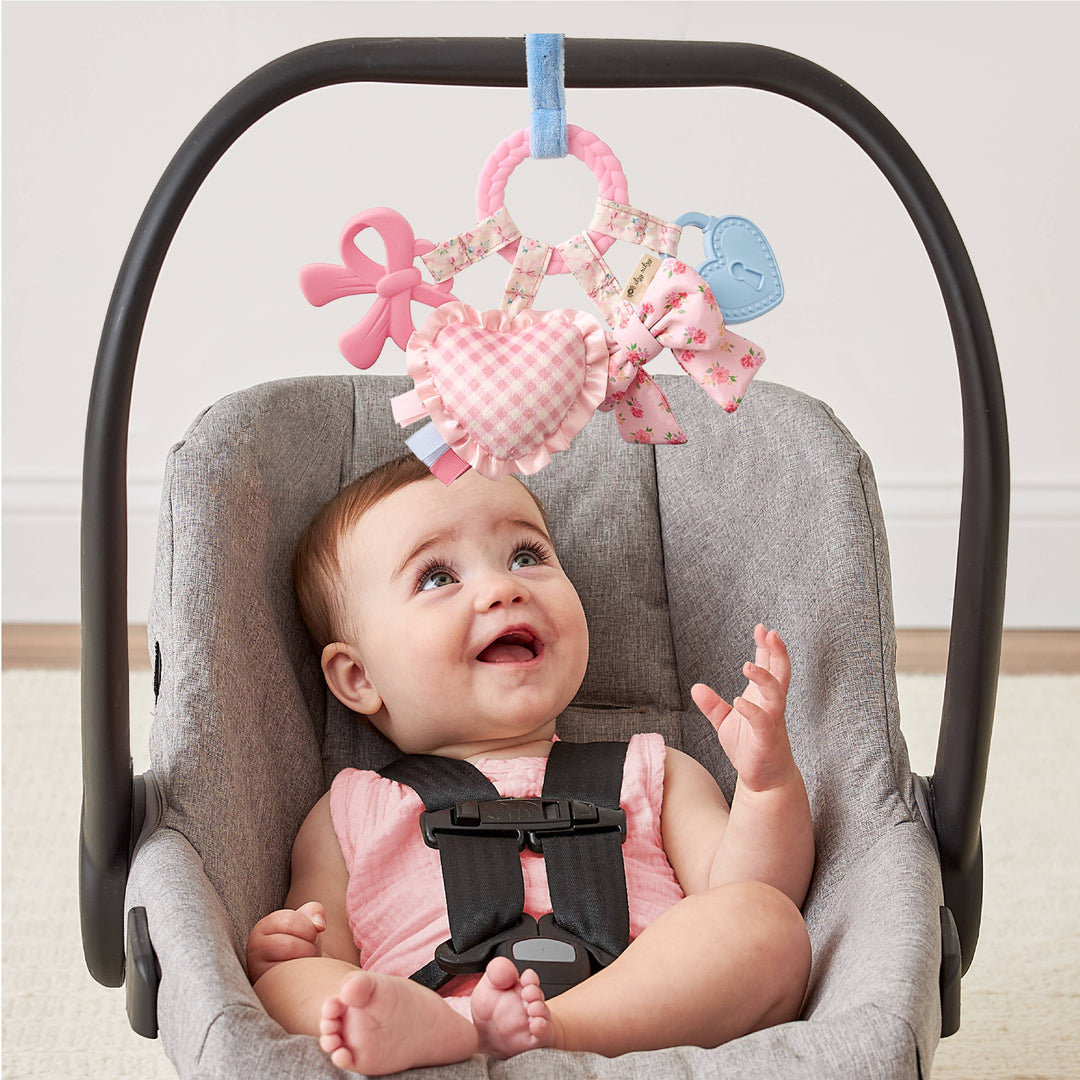 Itzy Ritzy Bow Bitzy Busy Ring -Stroller &amp; Car Seat Sensory Travel Toy