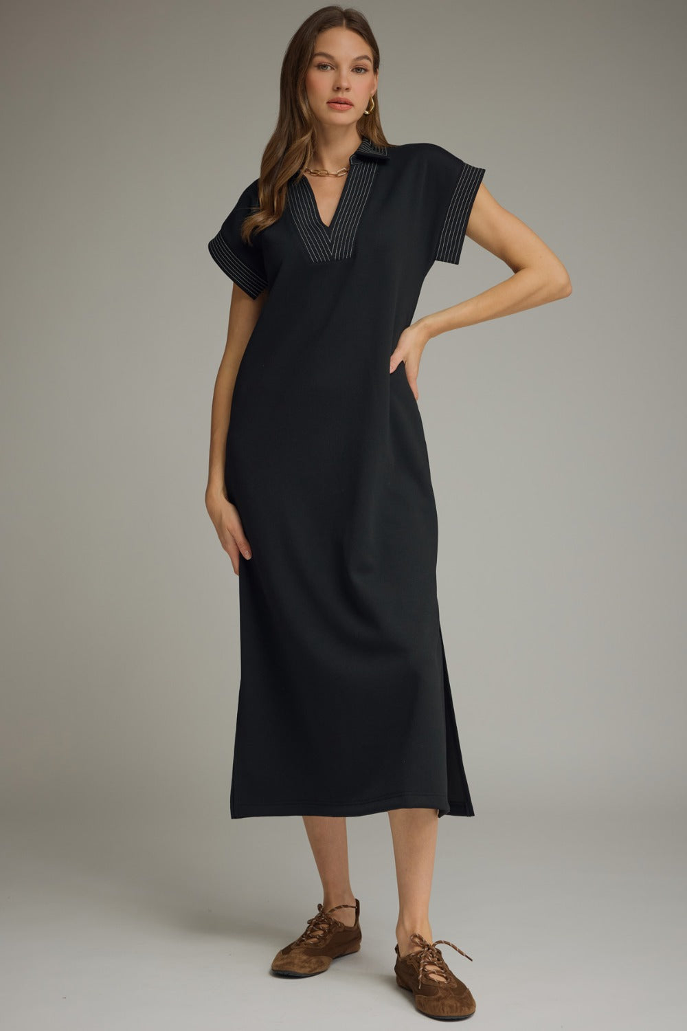 Model wearing the Entro Elara Dress in Black