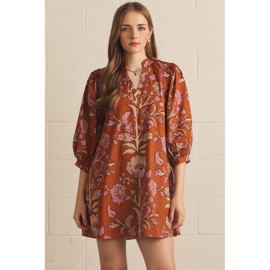 Model wearing the Entro Autumn Dress in Rust