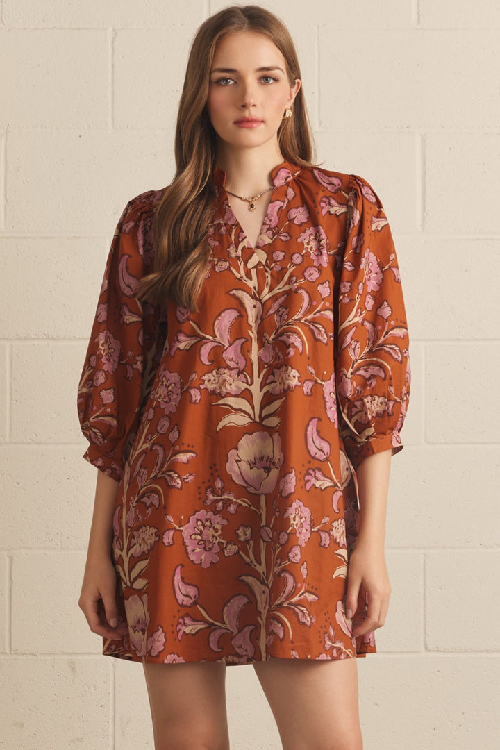 Model wearing the Entro Autumn Dress in Rust