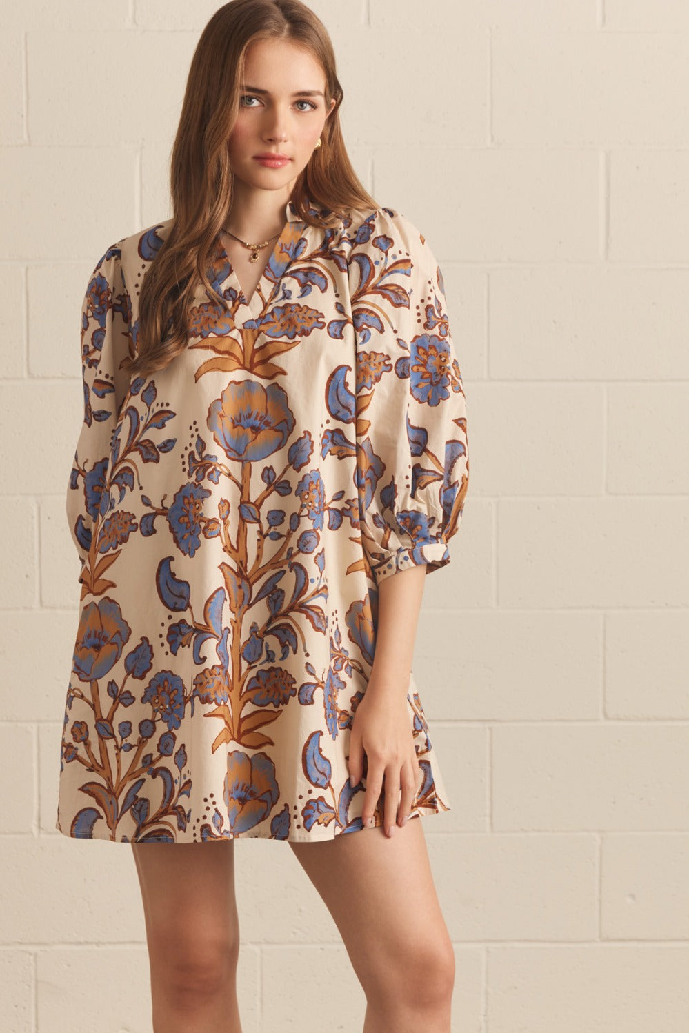 Model wearing the Entro Autumn Dress in Rust