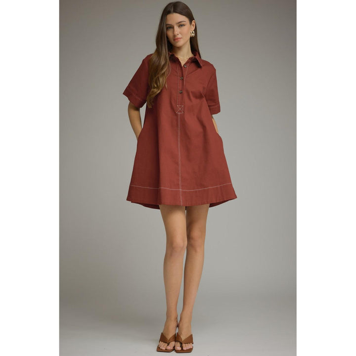 Model wearing the Entro Sienna Dress in Terra Cotta