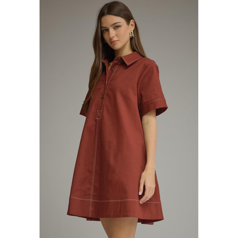 Model wearing the Entro Sienna Dress in Terra Cotta