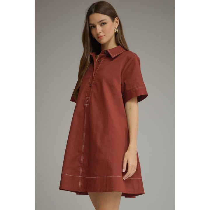Model wearing the Entro Sienna Dress in Terra Cotta