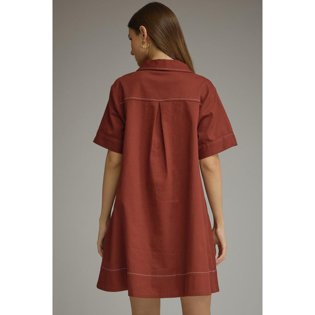 Model wearing the Entro Sienna Dress in Terra Cotta