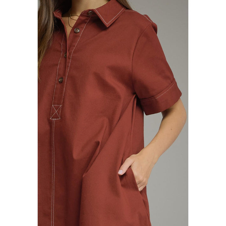 Model wearing the Entro Sienna Dress in Terra Cotta