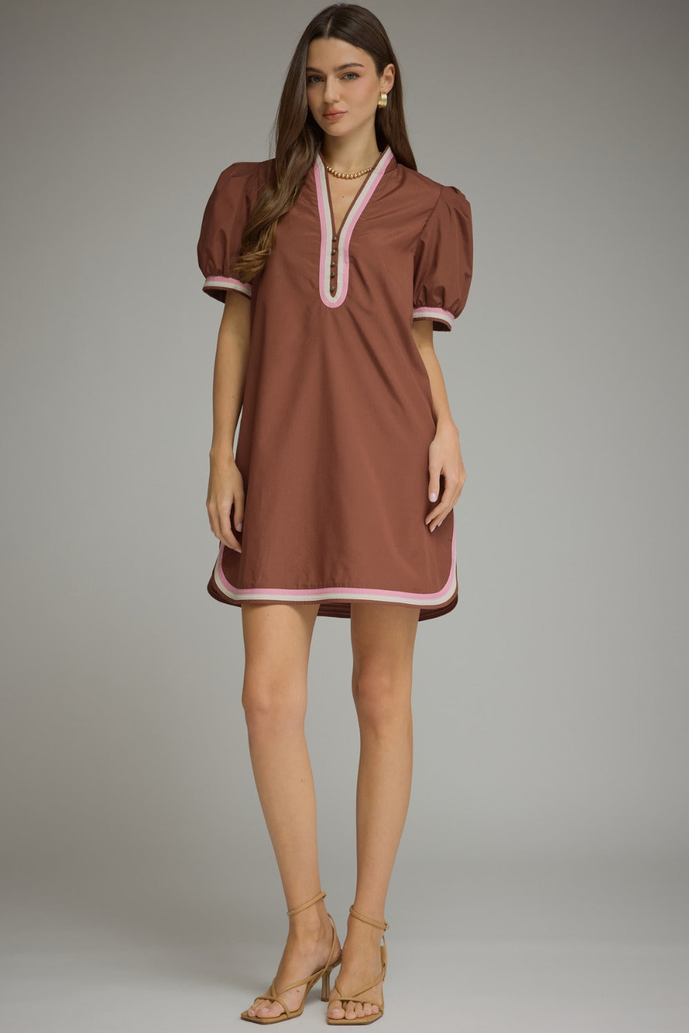 Model wearing the Entro Truffle Dress in Chocolate