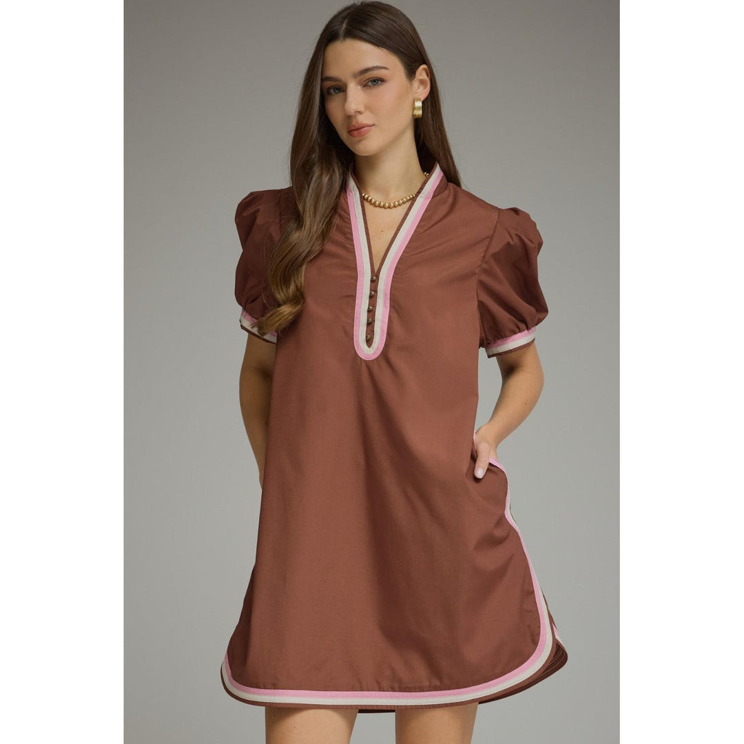 Model wearing the Entro Truffle Dress in Chocolate
