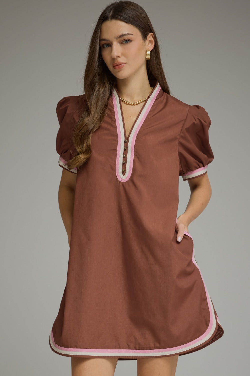 Model wearing the Entro Truffle Dress in Chocolate
