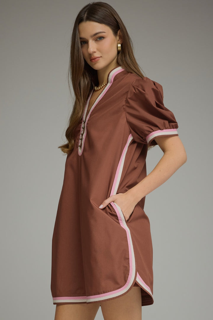 Model wearing the Entro Truffle Dress in Chocolate