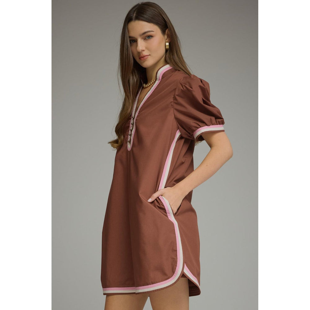 Model wearing the Entro Truffle Dress in Chocolate