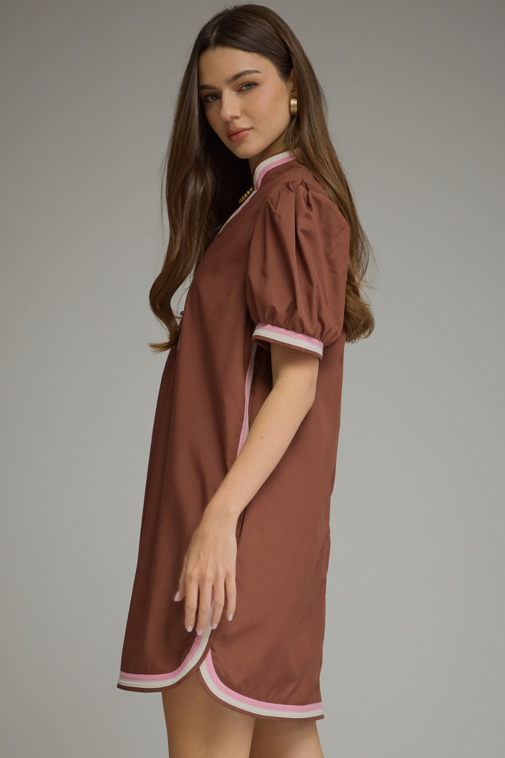 Model wearing the Entro Truffle Dress in Chocolate