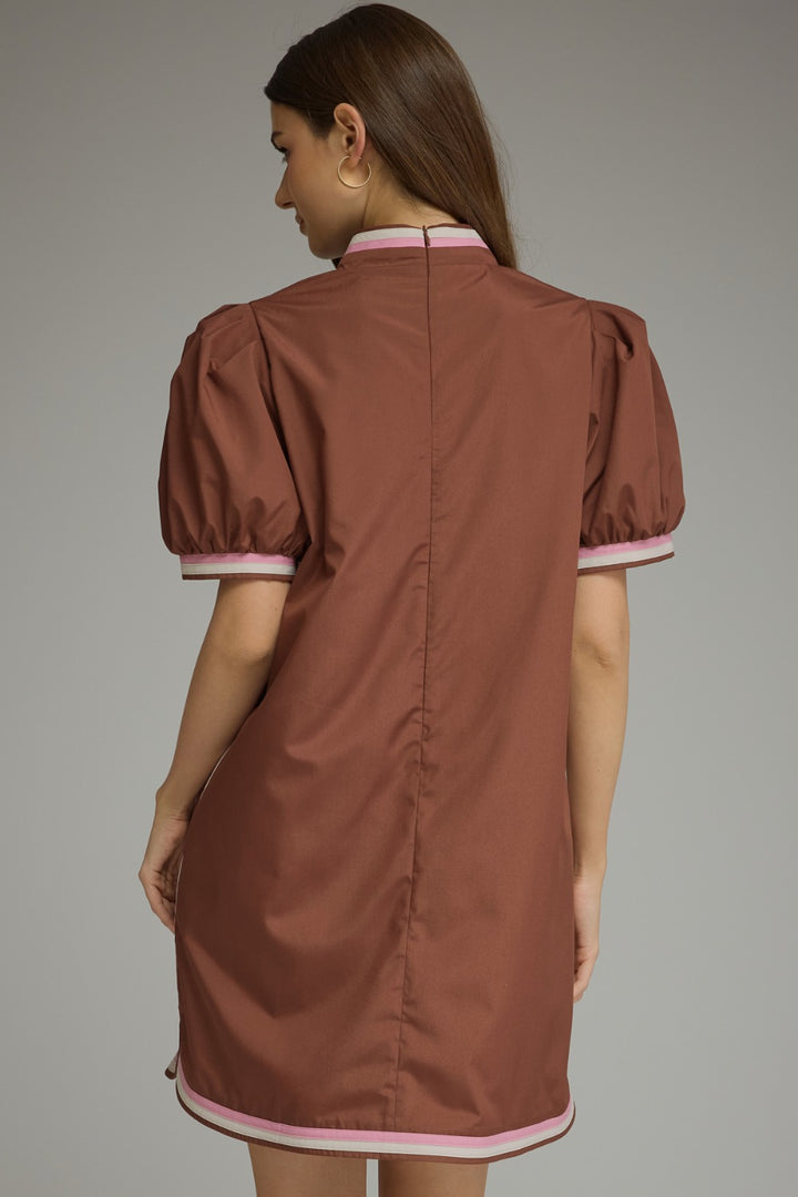 Model wearing the Entro Truffle Dress in Chocolate