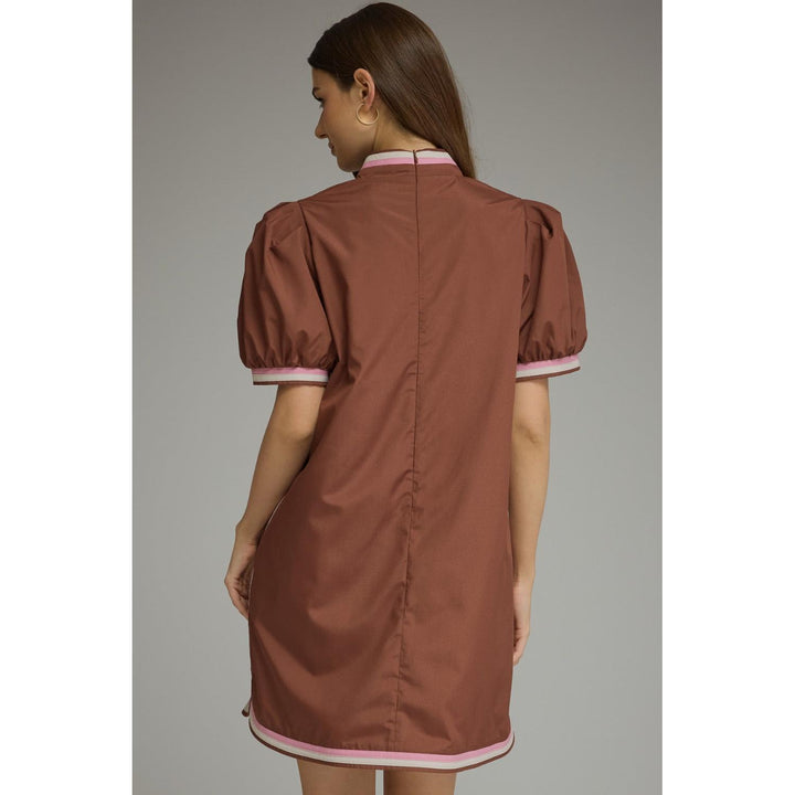 Model wearing the Entro Truffle Dress in Chocolate
