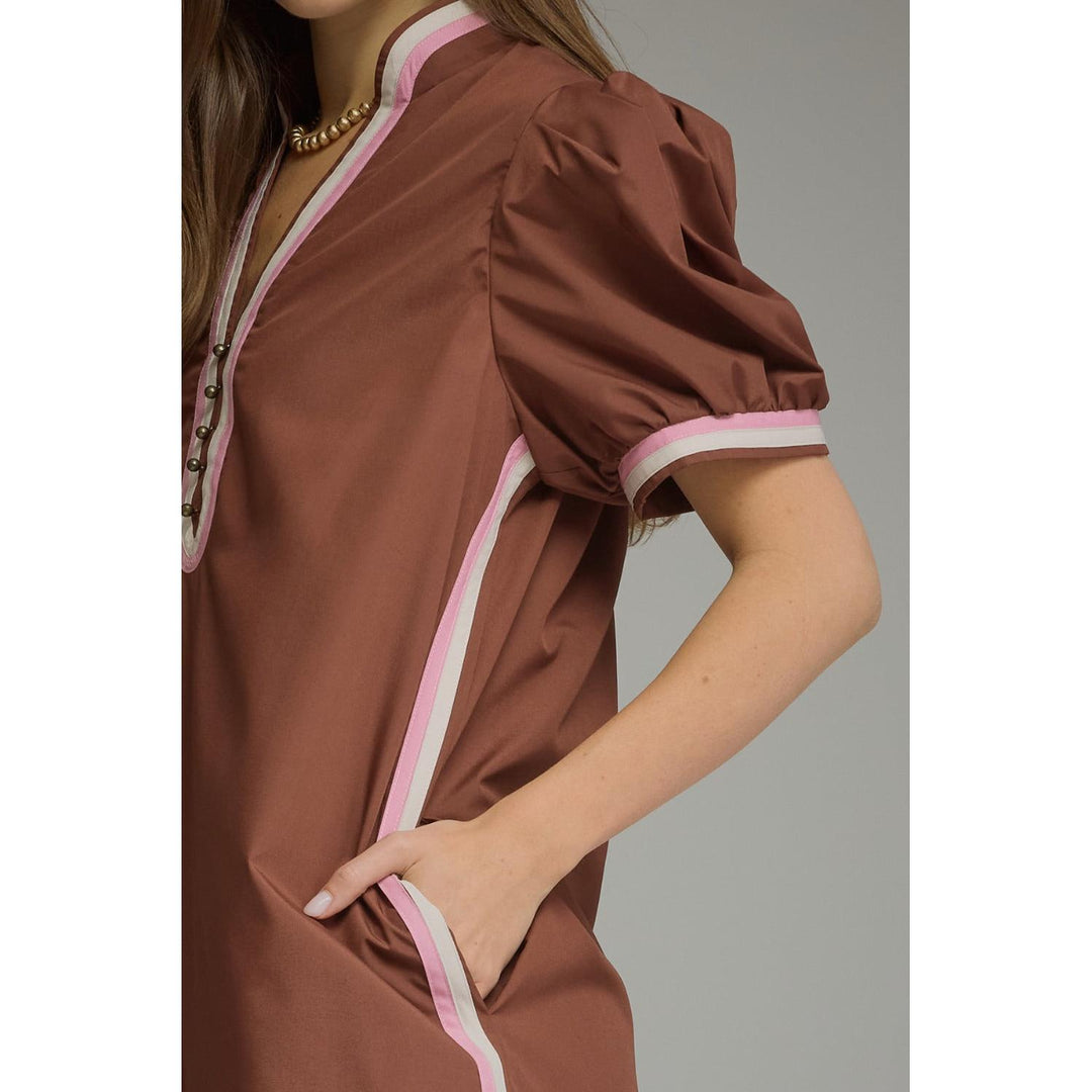 Model wearing the Entro Truffle Dress in Chocolate
