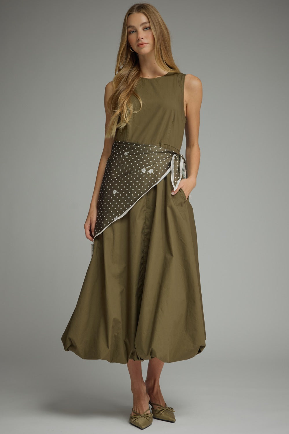 Model wearing the Entro Sage Dress in Olive