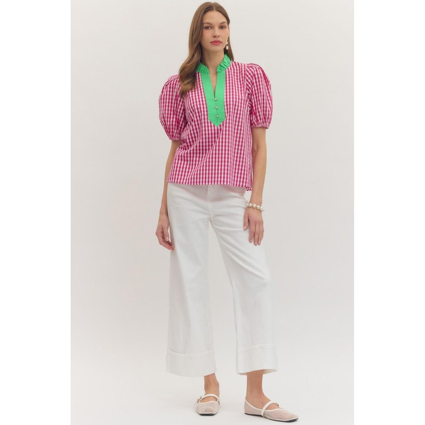 Entro "Chloe" top in hot pink gingham; features short puff sleeves and a ruffled V-neck collar.