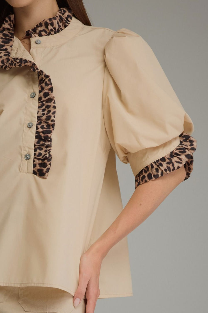 Entro Birch Top in Tan featuring a mock neckline, short sleeves, and an effortless silhouette.