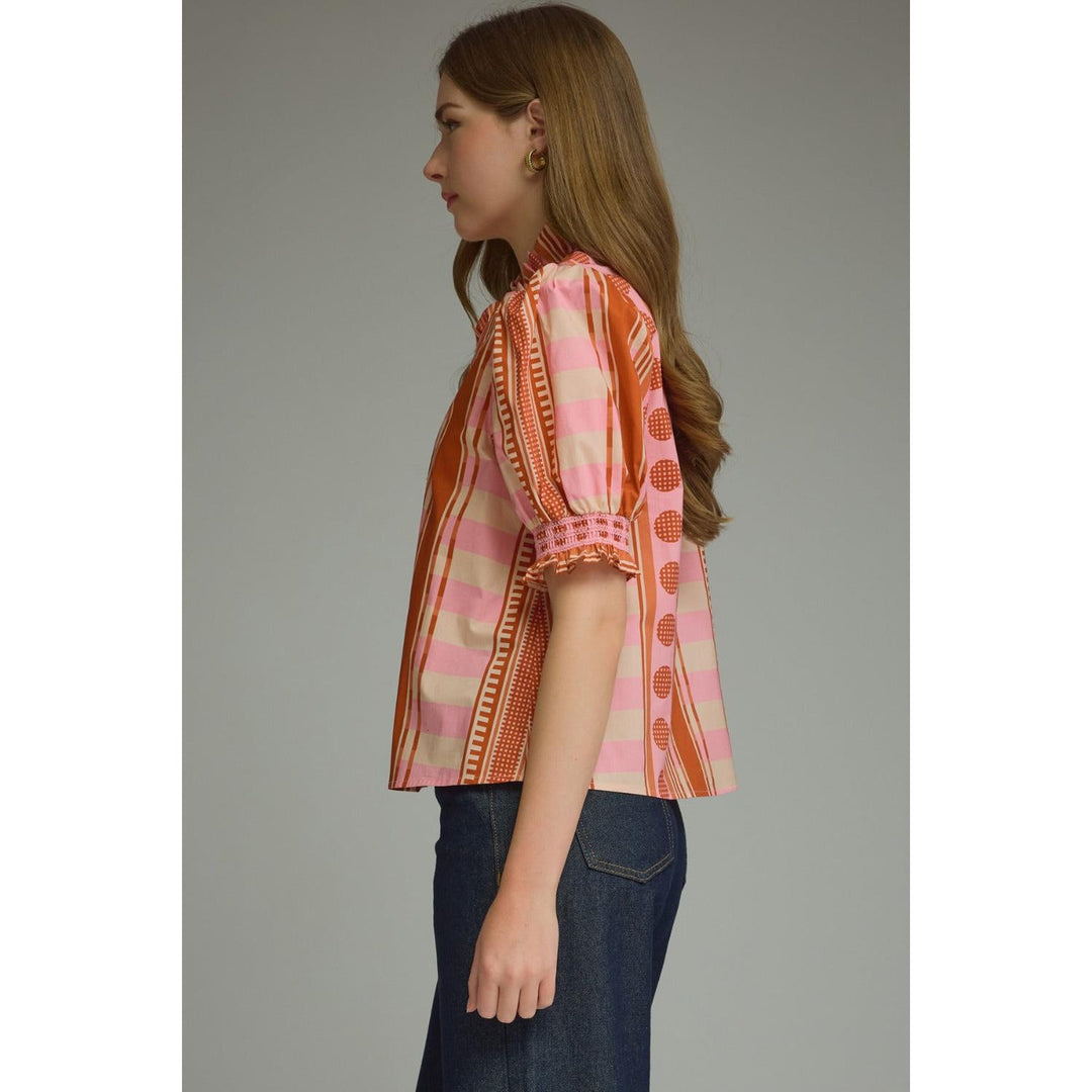Model wearing the Entro Rosette Top in Rust Pink