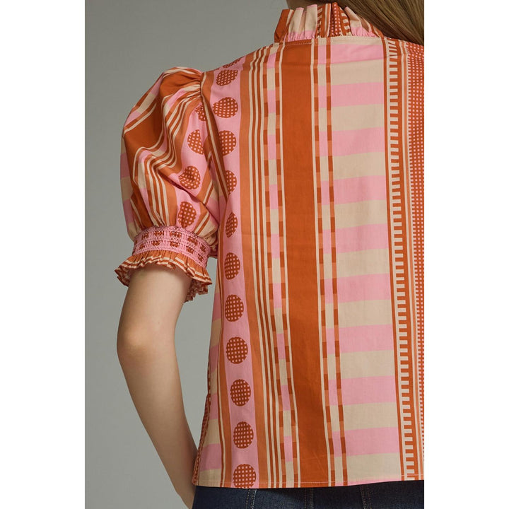 Model wearing the Entro Rosette Top in Rust Pink