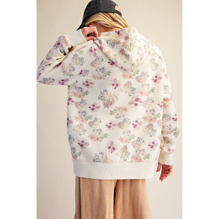 Back view of ecru floral print hooded pullover