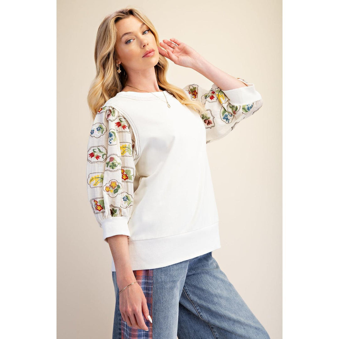 Wren ivory terry knit top with floral embroidered puff sleeves, front view