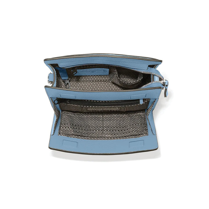 Close-up of the front organizer pocket on the Findley bag showing the ID window and credit card slots.