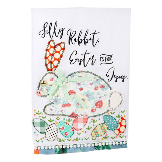 Glory Haus 'Easter is For Jesus' white cotton tea towel featuring a colorful whimsical rabbit design with patterned Easter eggs and hand-lettered inspirational text