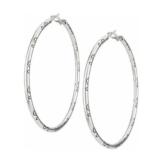 Oversized polished silver hoop earrings by Brighton featuring a signature heart charm detail.