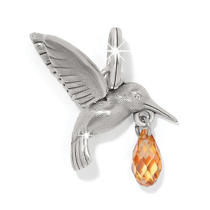 Highly detailed silver hummingbird charm by Brighton with a vibrant orange crystal accent.