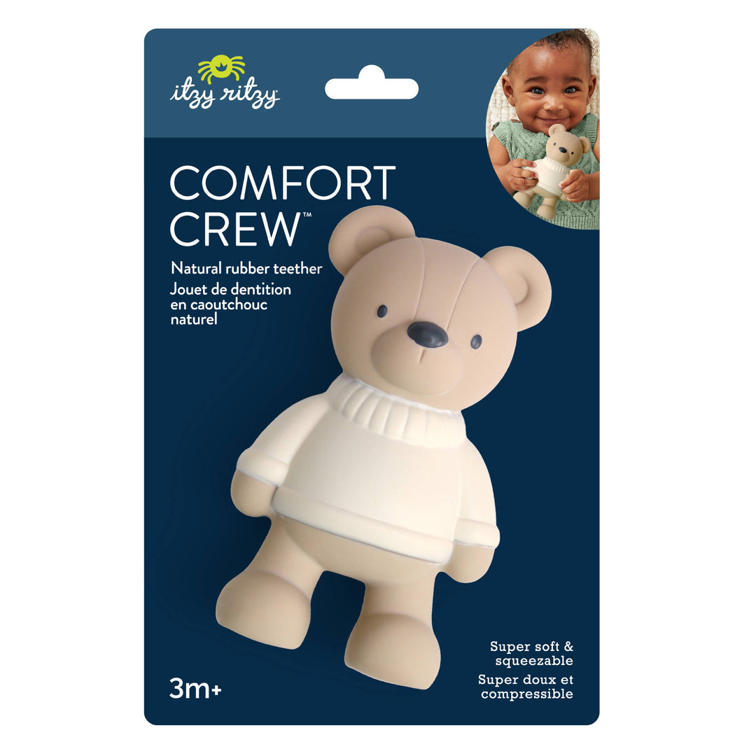 Itzy Ritzy Comfort Crew™ Bear in retail packaging; a beige natural rubber baby teether designed with a textured body and long ears for molar relief