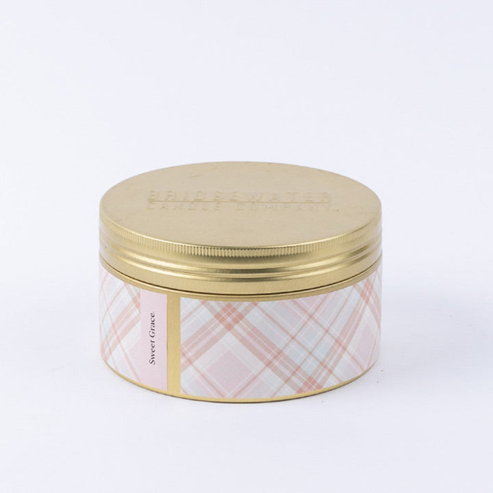 Bridgewater Candle Sweet Grace Holiday 3-Wick Tin featuring a beautifully decorated festive candle tin.