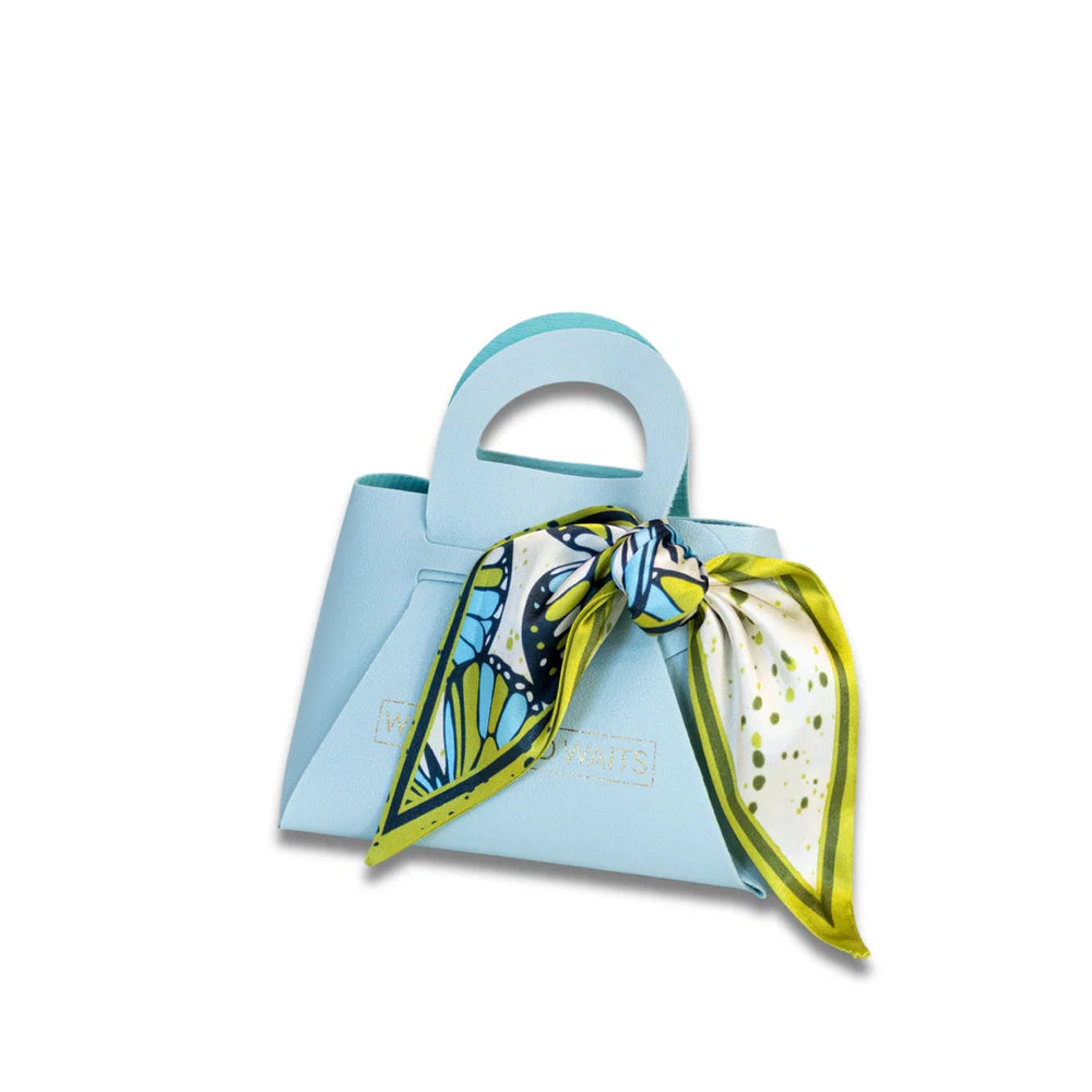 Winton and Waits Marina Monarch Accessory Scarf in a bold print, packaged in a mini gift bag.