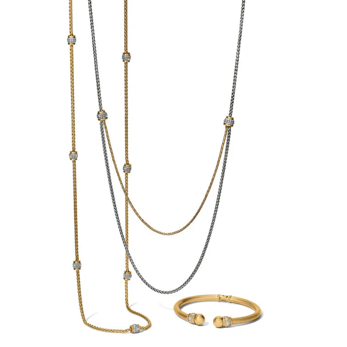 Close-up of the lobster claw closure and crystal detailing on the Meridian Petite Gold Necklace.