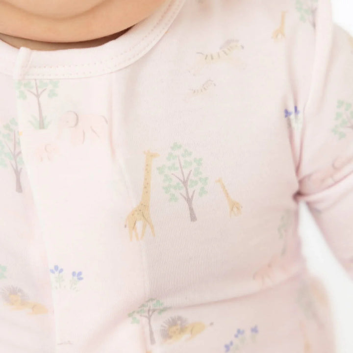Magnetic Me infant sleeper in Pink Serene Safari print showing the footed design and soft modal texture.