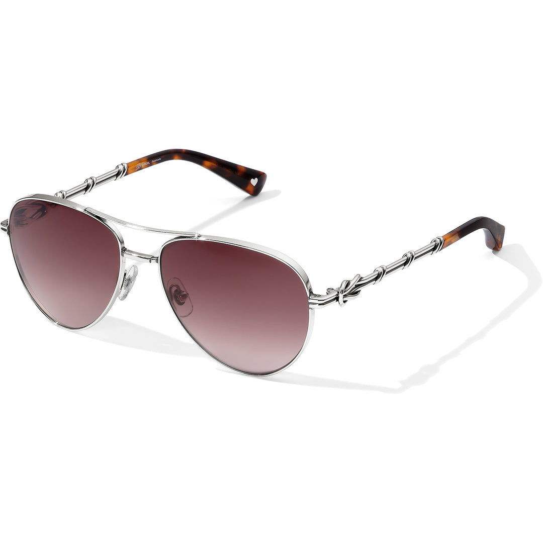 Brighton Interlok Harmony Sunglasses featuring silver metal aviator frames and interlocking temple details.