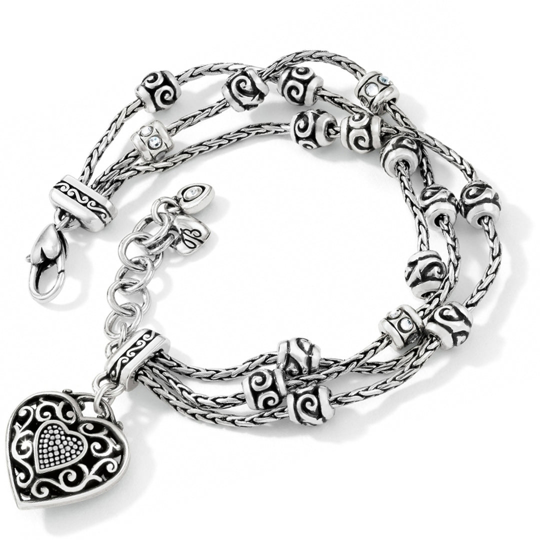 Brighton Reno Heart Bracelet showing textured silver-plated roped heart charms set with brilliant fine crystals on an adjustable link chain.