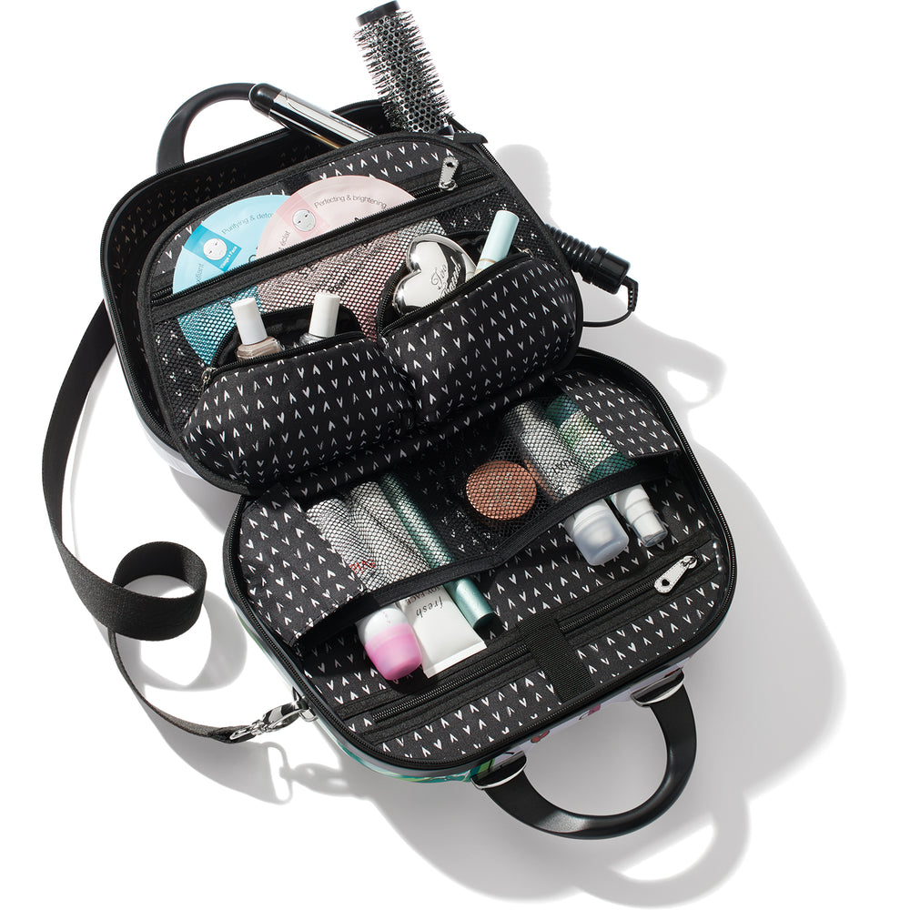 Brighton Headlines Cosmetic Case featuring a hard-shell exterior with multi-colored Fashionista headline art.