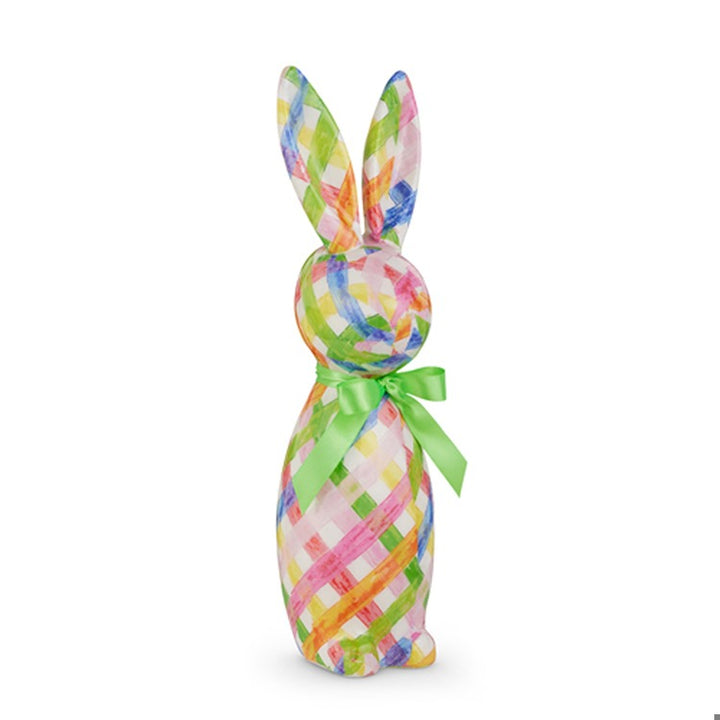 Colorful plaid Easter bunny with a green bow on a white background