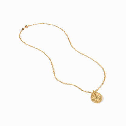 Close-up of the carved coin pendant and the authentic Julie Vos hallmark.