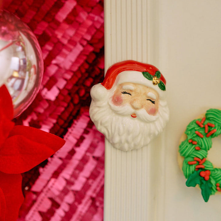 Nora Fleming Jolly Old Soul Christmas Santa mini shown in a holiday table setting