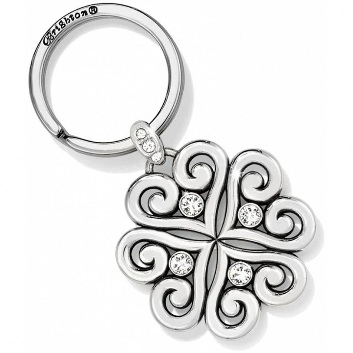 Brighton Alcazar Love Key Fob showing a silver-plated heart charm with openwork filigree swirls and fine crystal accents on a matching silver keyring.