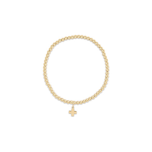 enewton 3mm gold-filled beaded bracelet with a signature 8mm gold cross charm; waterproof and stackable.