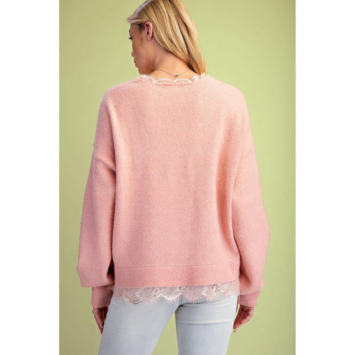 Darla coral relaxed fit sweater pullover styled with jeans