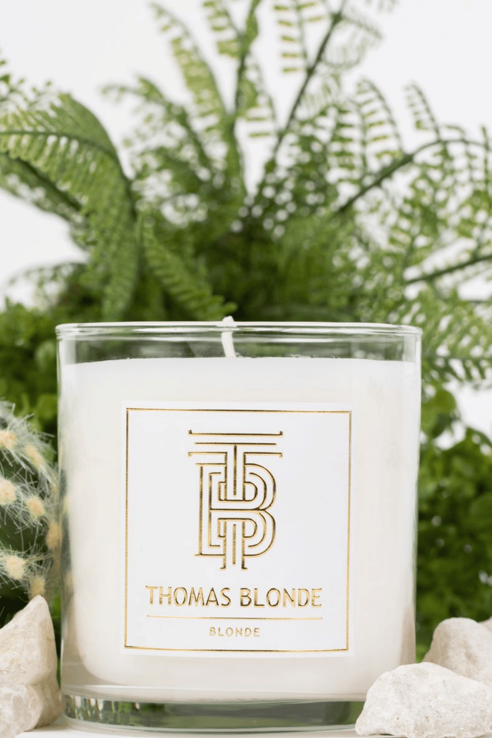Thomas Blonde Signature Scent 12 oz hand-poured candle in a clear glass jar.
