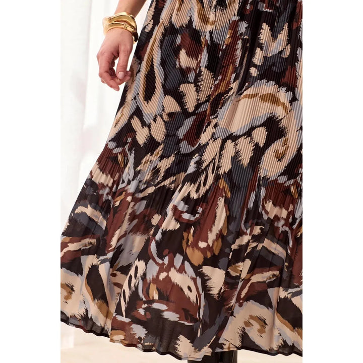 Close-up of the delicate plissé texture and pattern on the Tribal steel skirt.